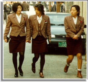 Three Uniformed Office Girls During Lunchtime