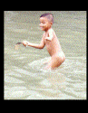 Naked Boy Playing in the Flood Waters